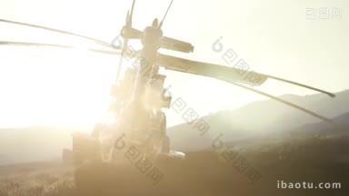 在夕阳时在<strong>沙漠里</strong>燃烧<strong>的</strong>军事直升机